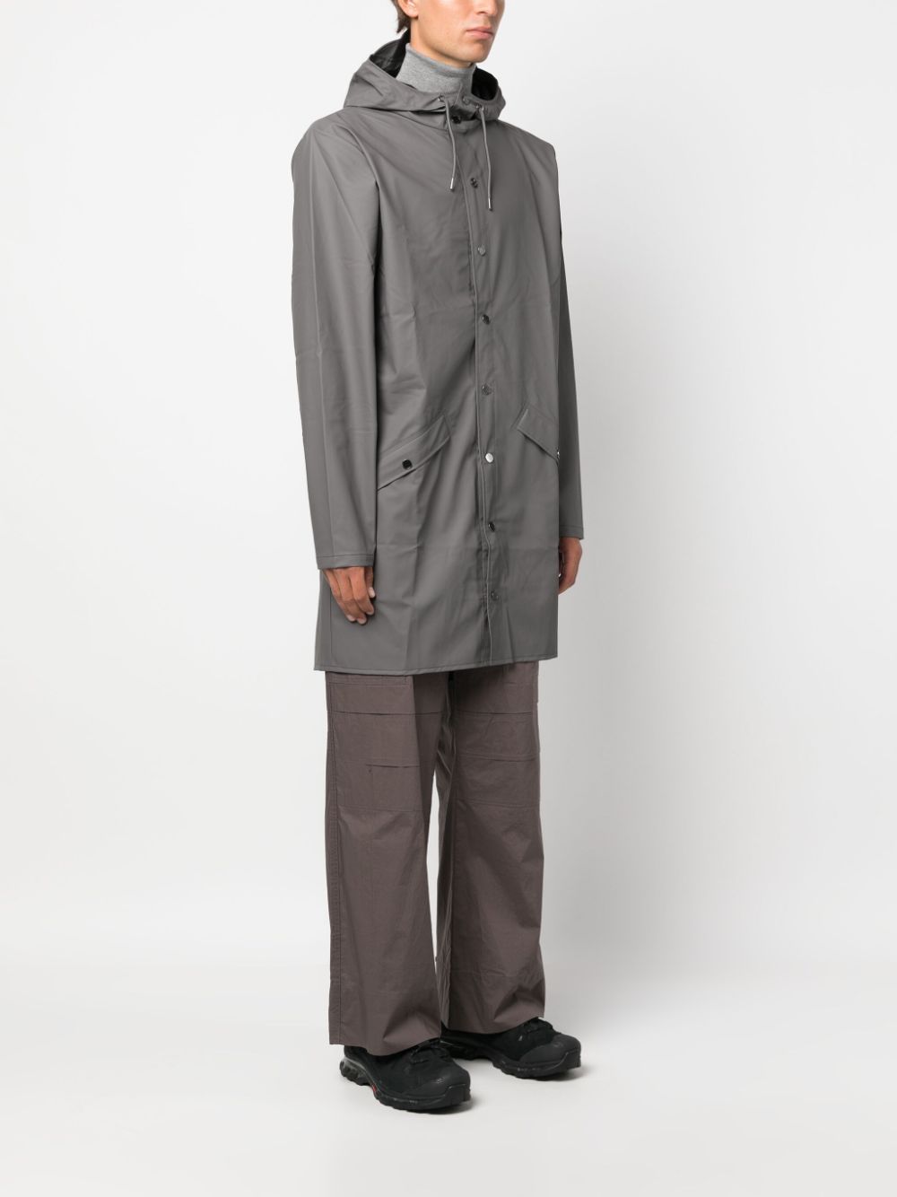 imperméable à capuche avec fermeture à boutons-pression