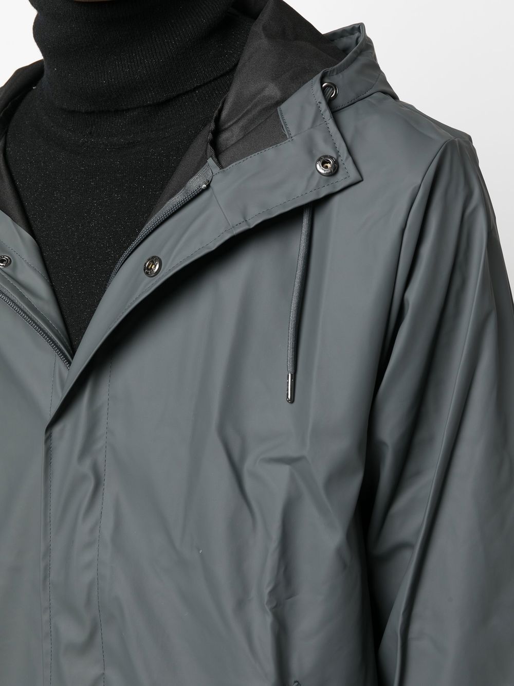 imperméable à capuche avec cordon de serrage