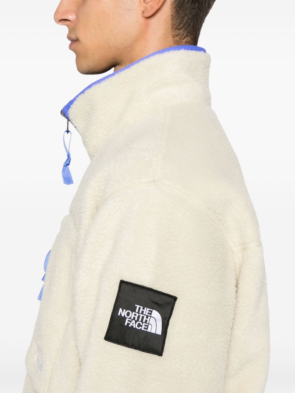 x Veste polaire réversible Yinka Ilori
