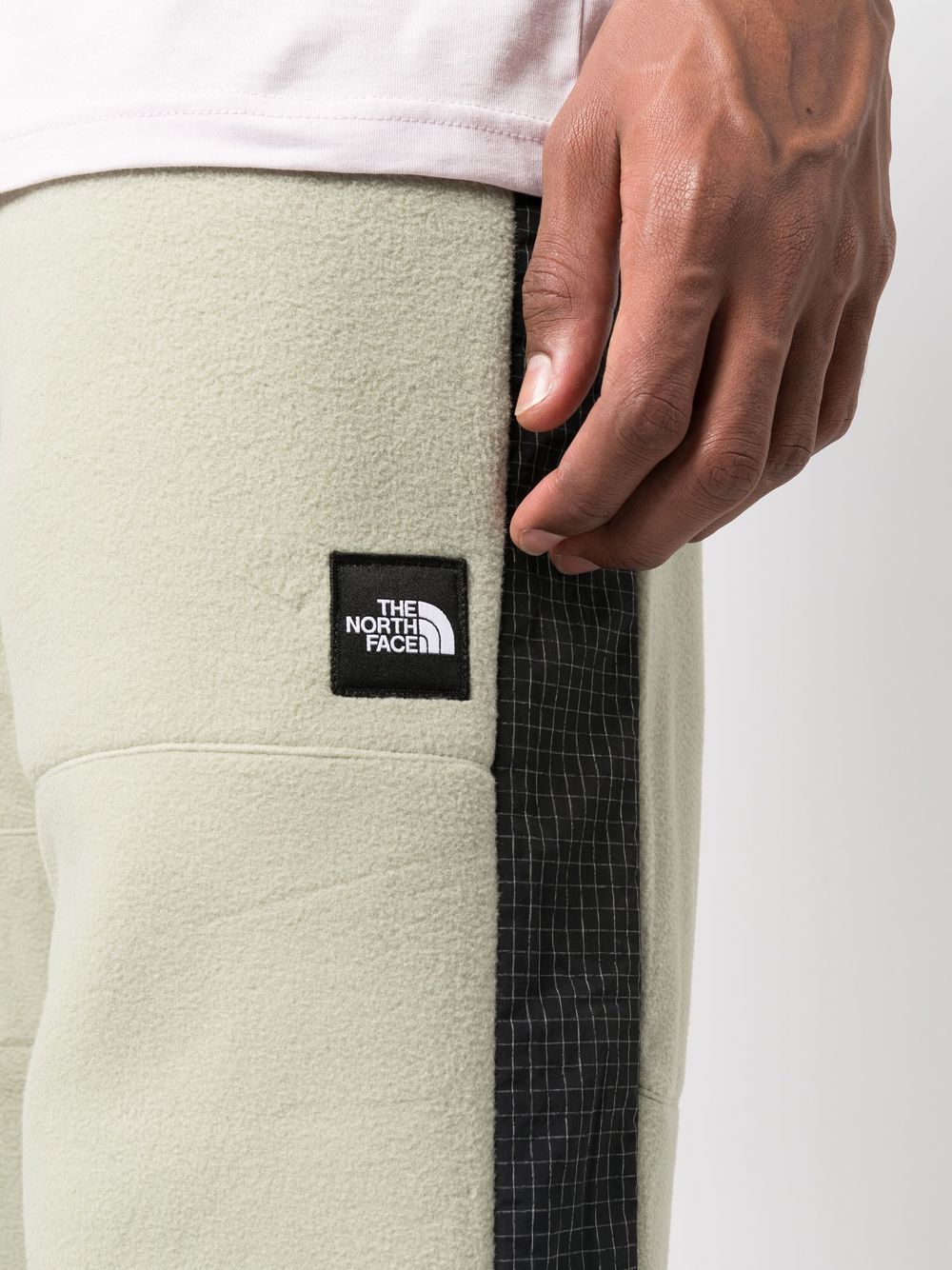 pantalon de survêtement en polaire à rayures latérales