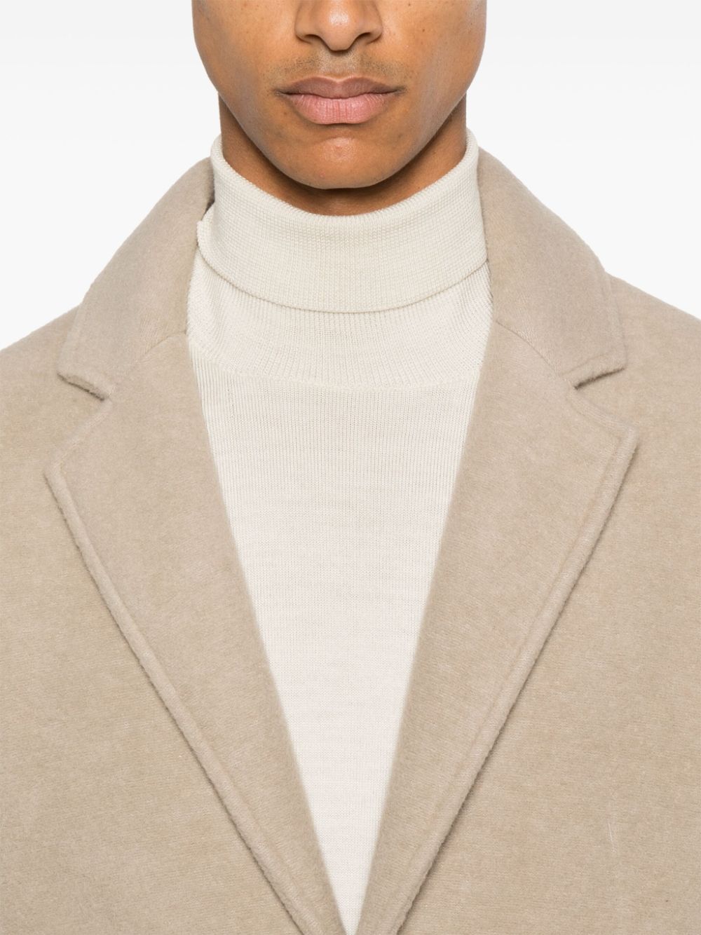 manteau avec logo caoutchouté
