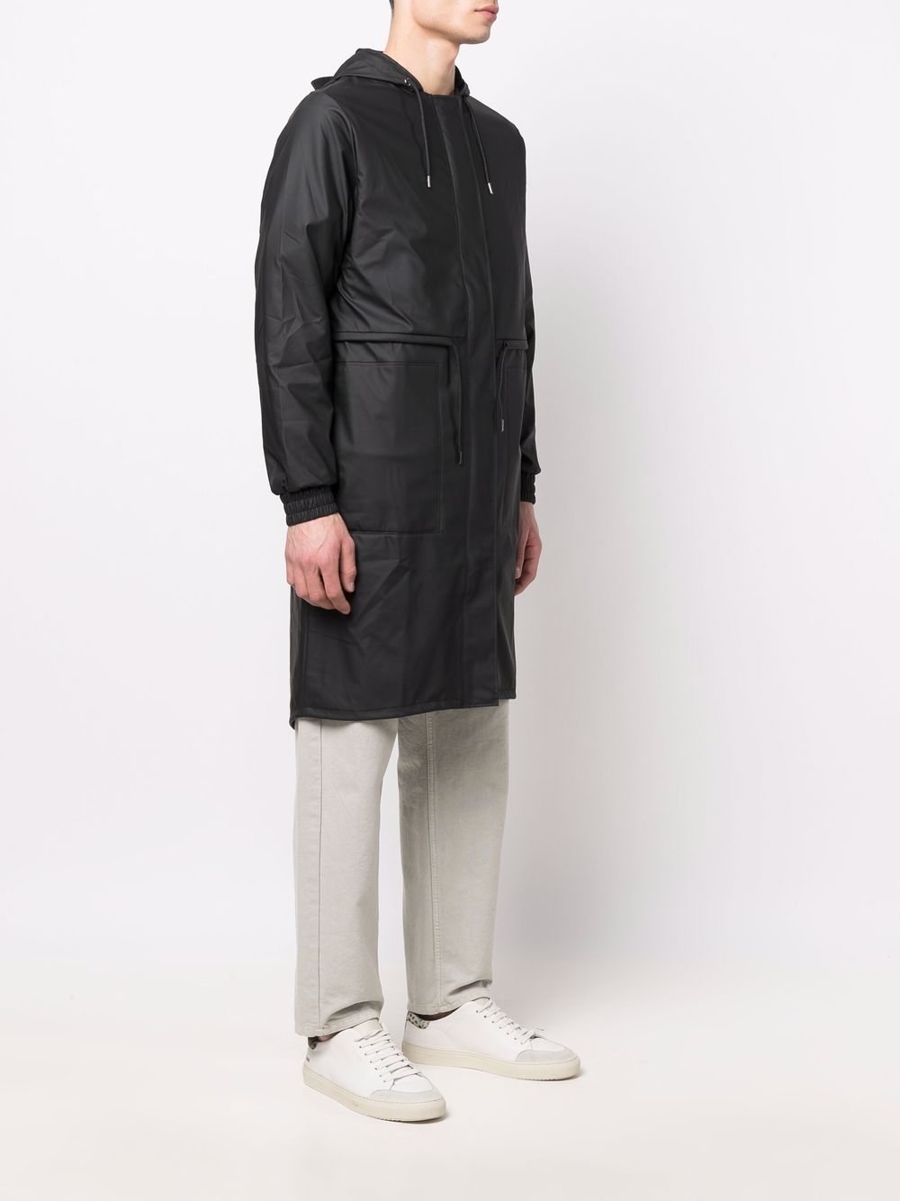imperméable à capuche avec cordon de serrage