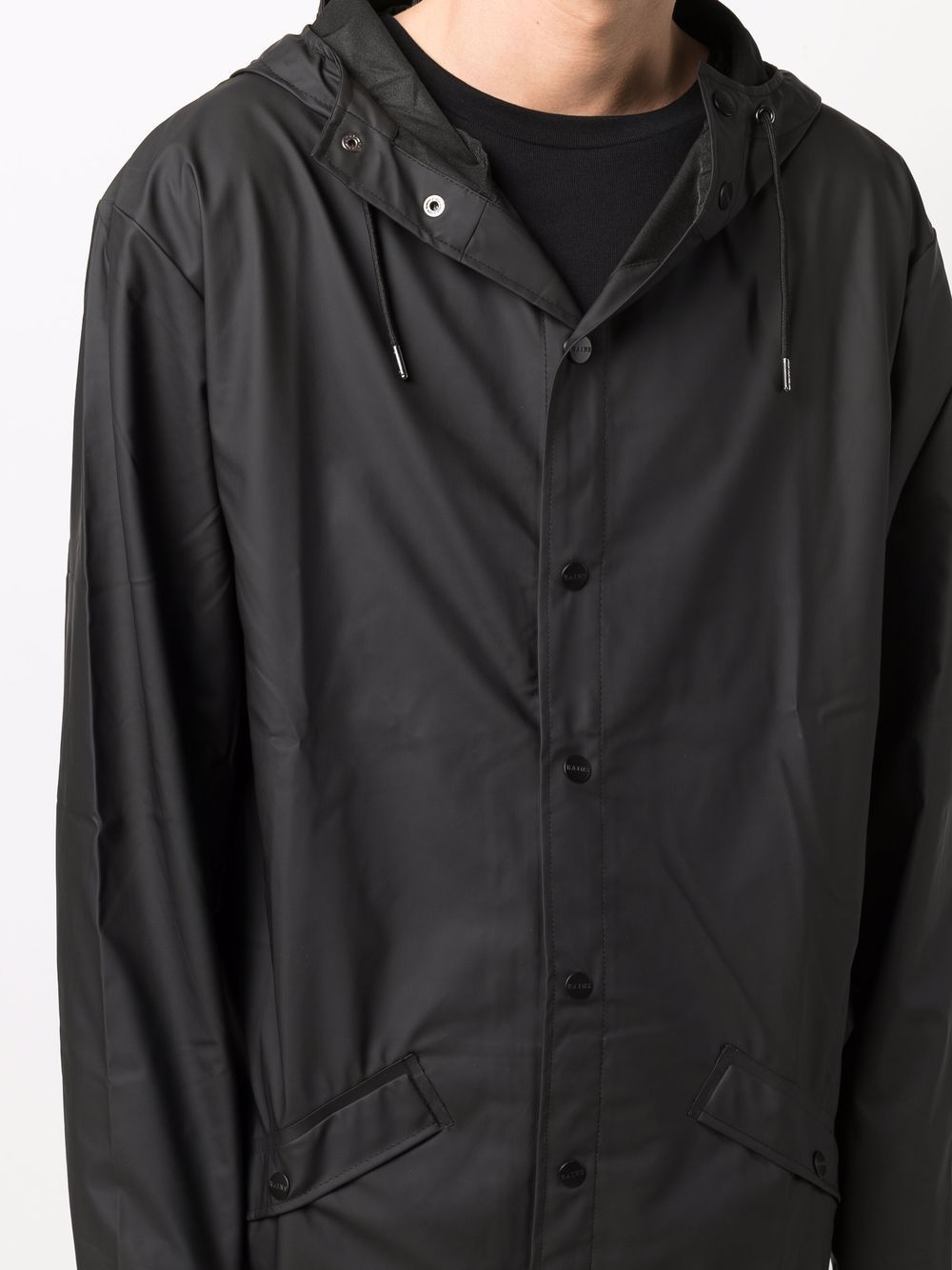 imperméable à capuche avec bouton-pression