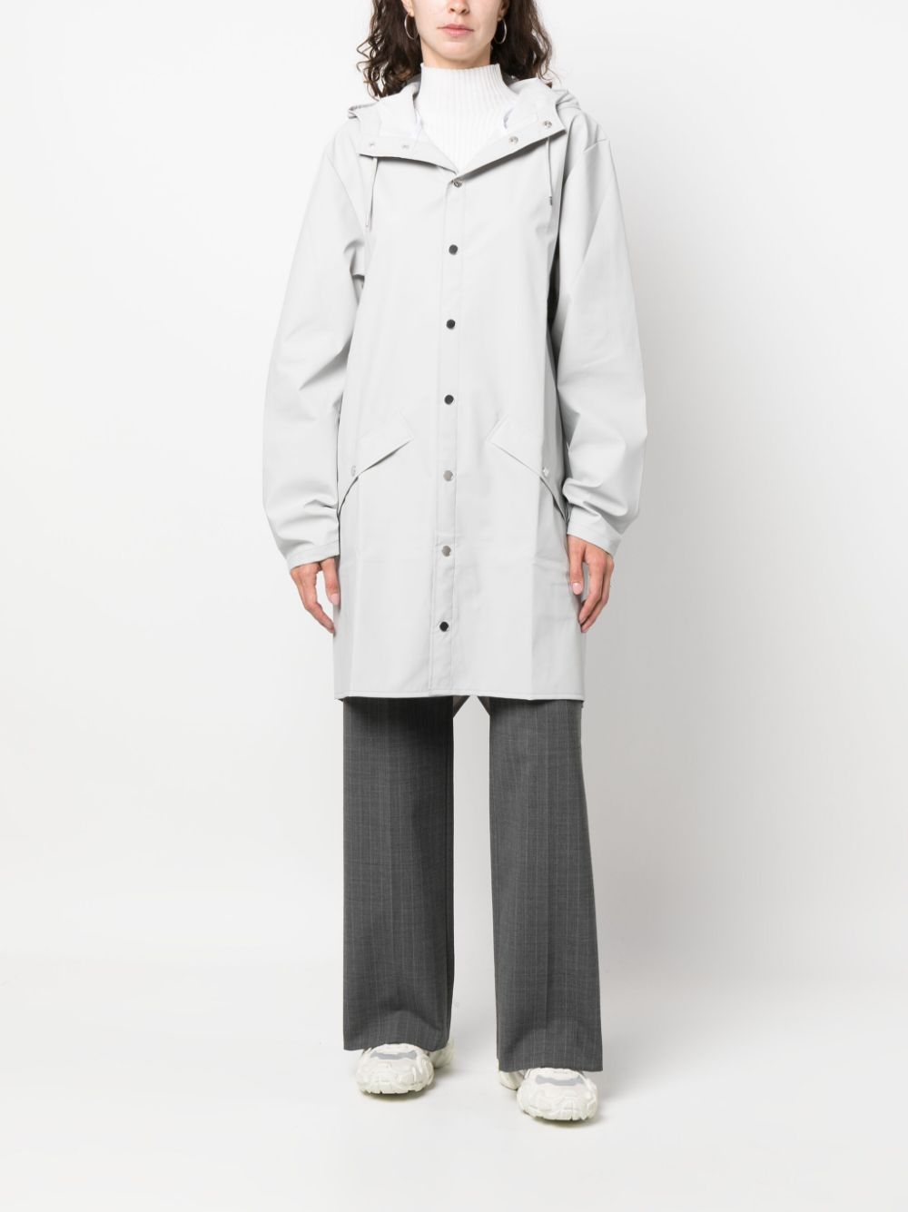 imperméable à capuche avec fermeture à boutons-pression