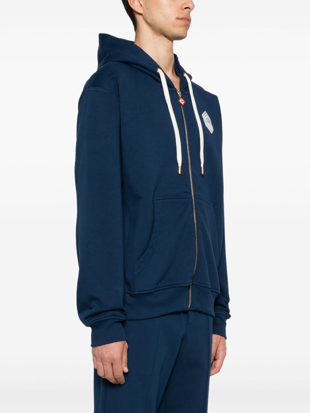 sweat à capuche avec logo caoutchouté