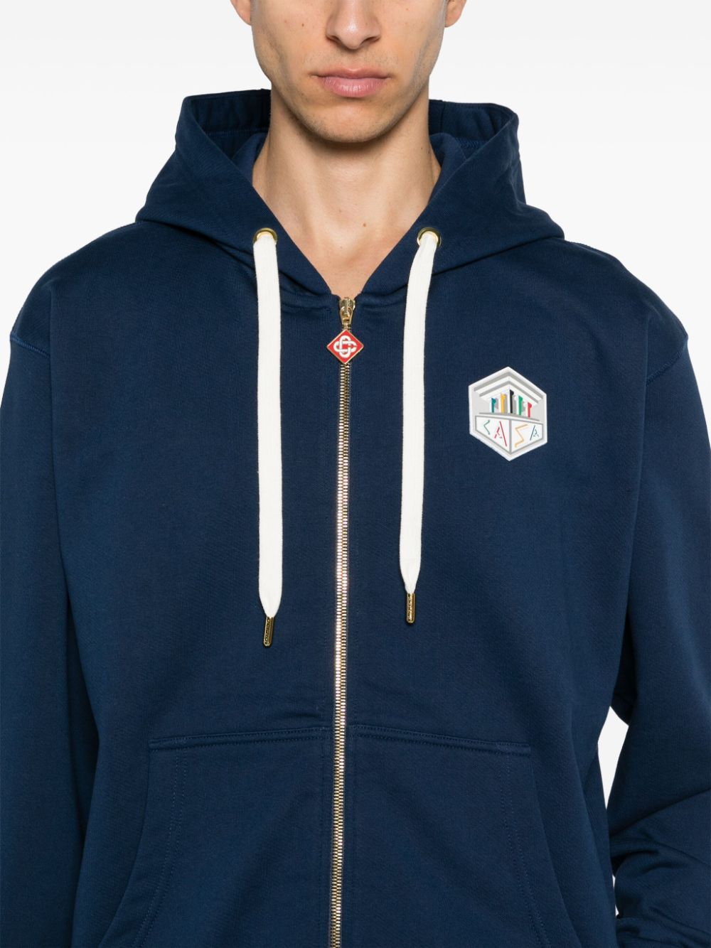 sweat à capuche avec logo caoutchouté