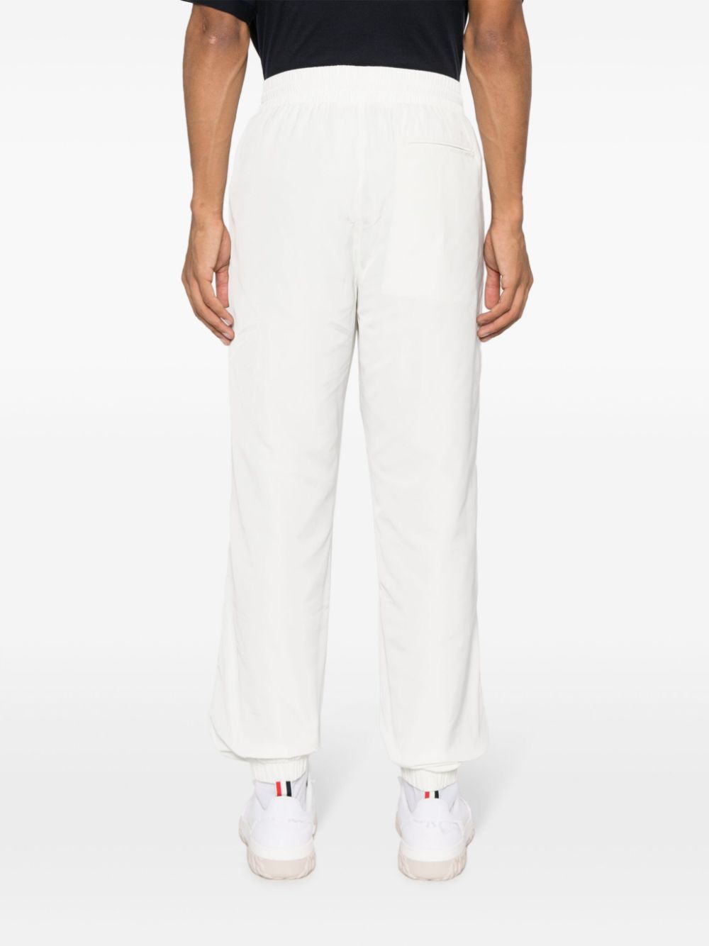 pantalon de survêtement à bande latérale et patch logo