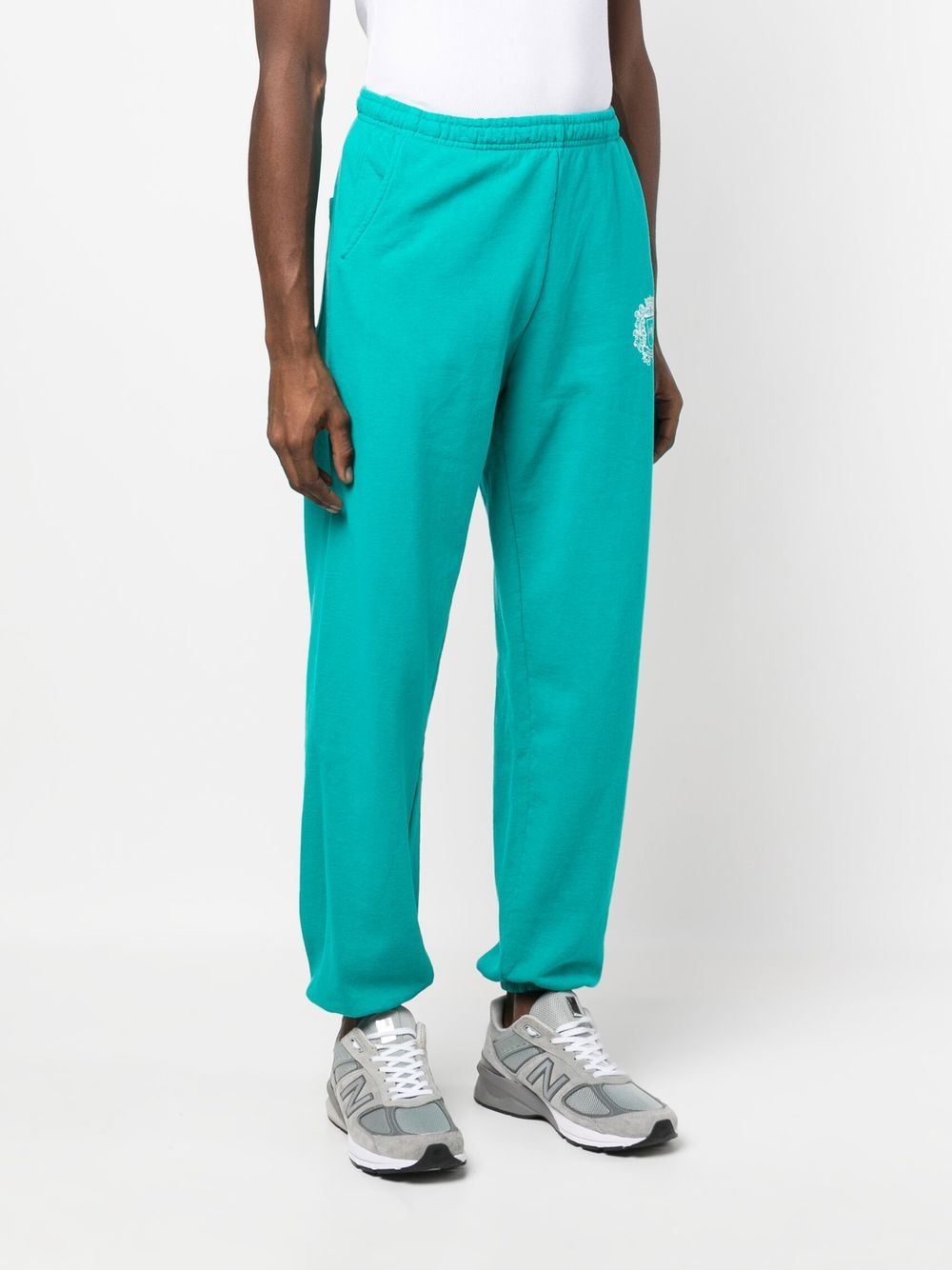 crest logo print track pants