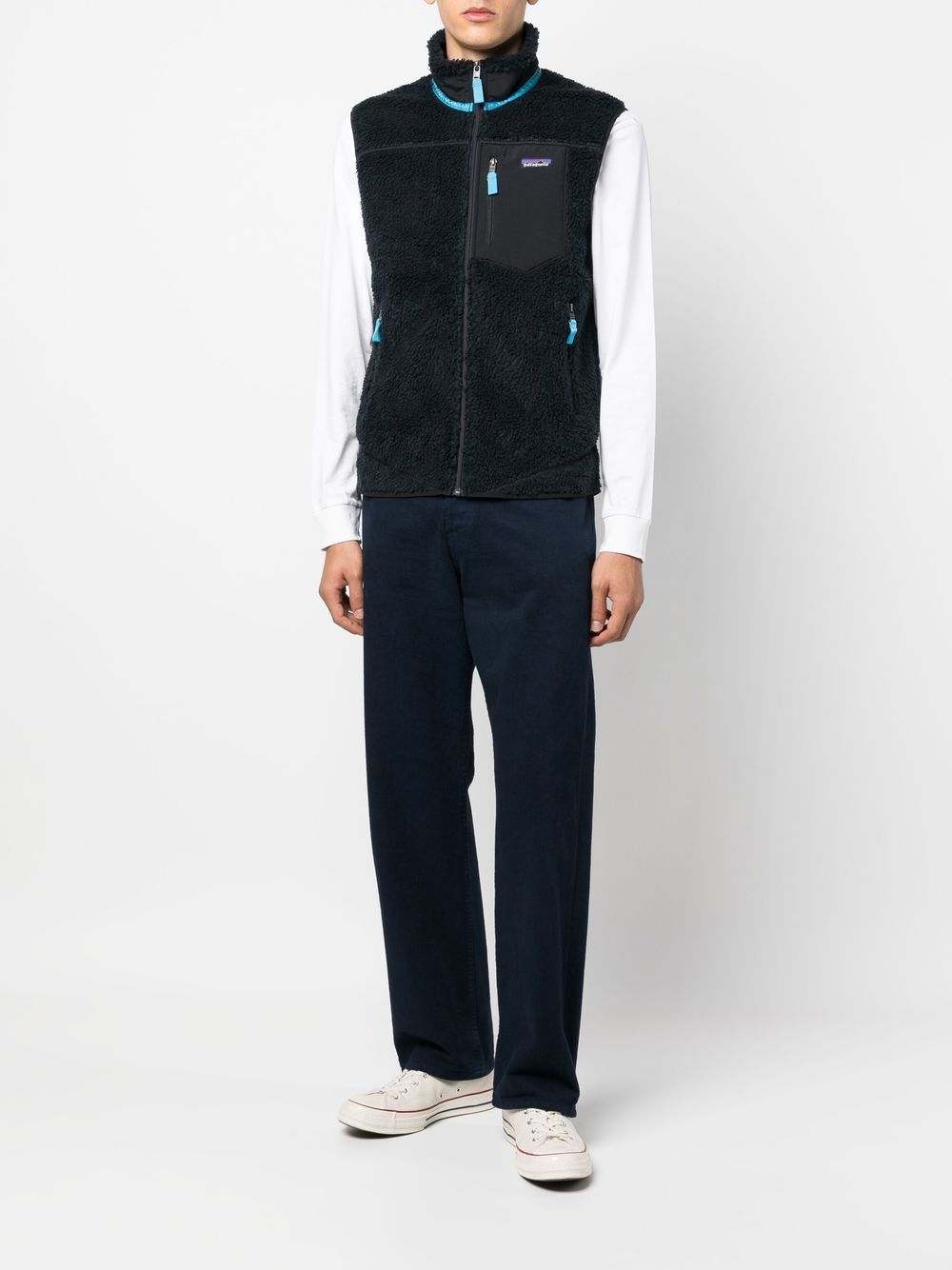 gilet en fausse peau de mouton avec patch logo