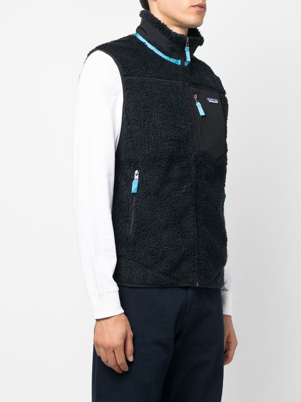 gilet en fausse peau de mouton avec patch logo