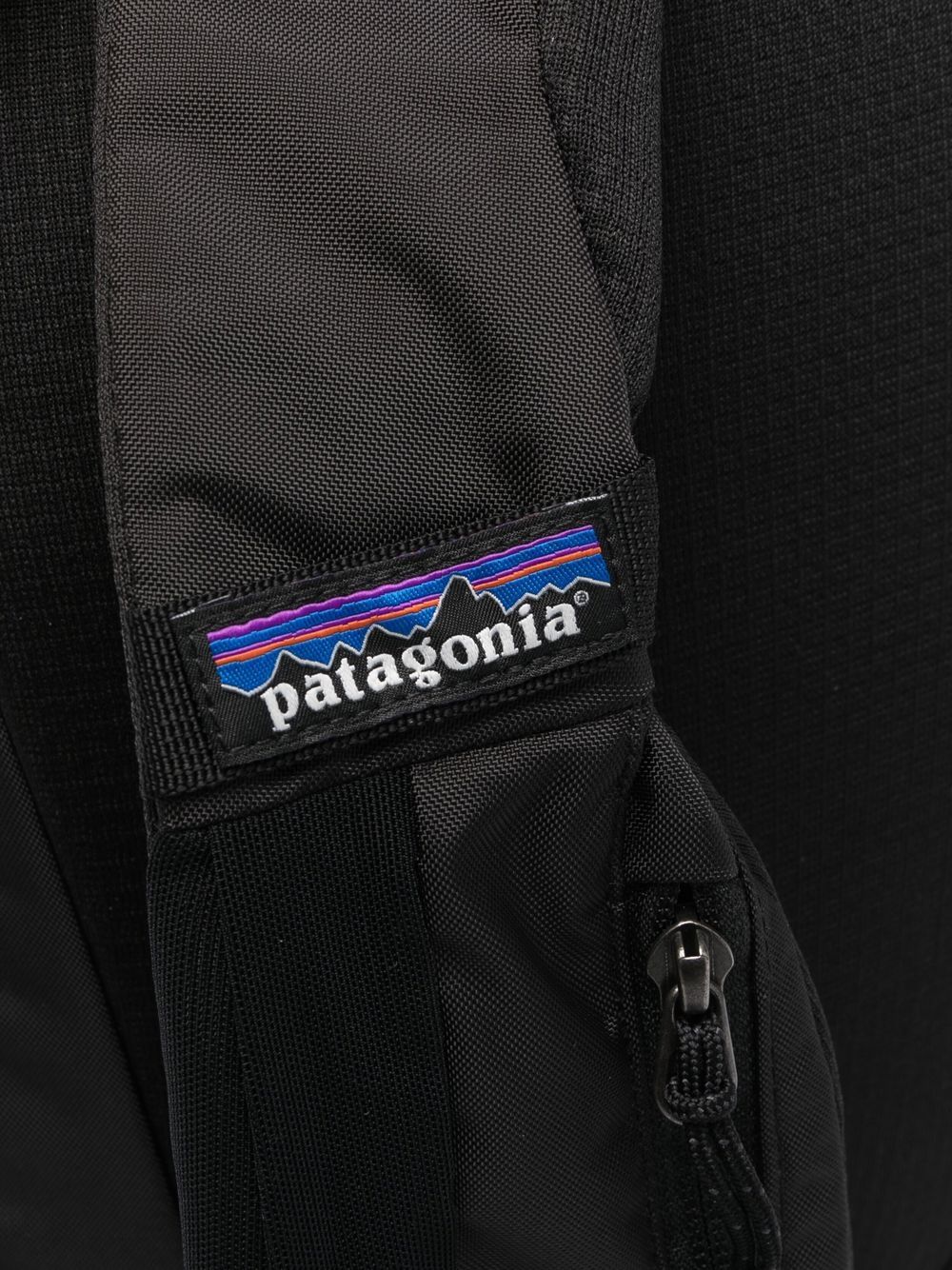 Atom logo-print sling backpack