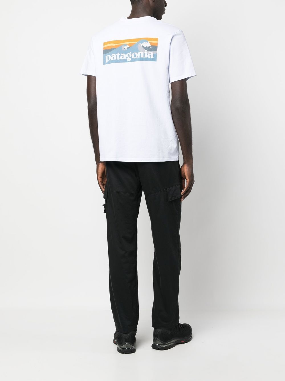 T-shirt de performance à poche plaquée