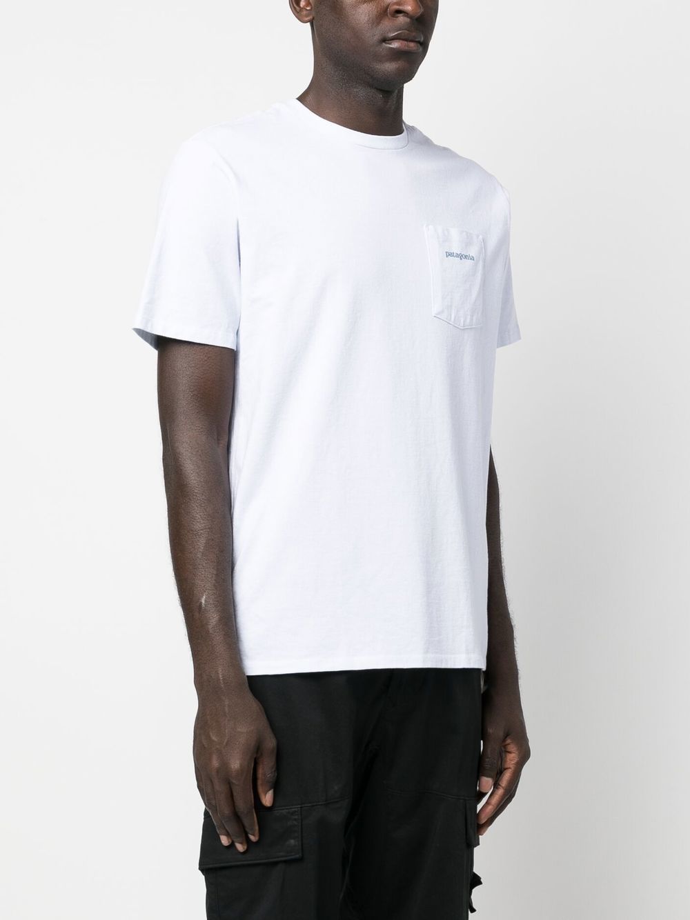 T-shirt de performance à poche plaquée