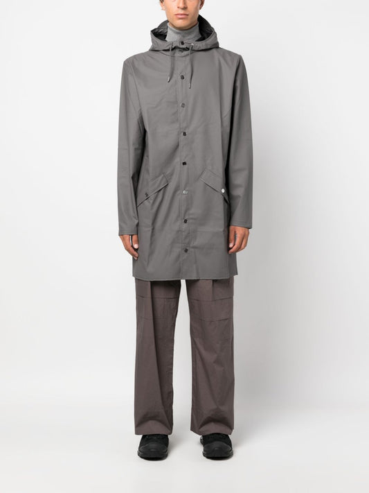imperméable à capuche avec fermeture à boutons-pression