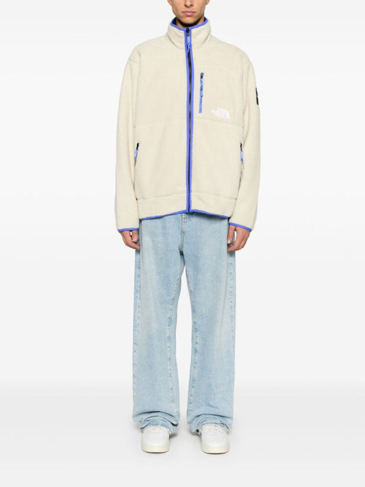 x Veste polaire réversible Yinka Ilori