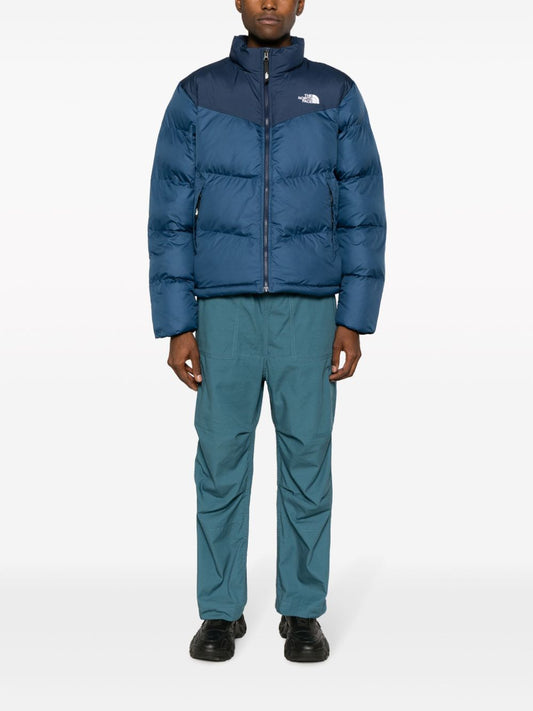 Saikuru logo-embroidered quilted jacket