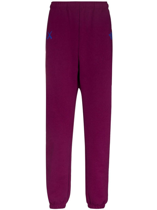 x KAWS track pants