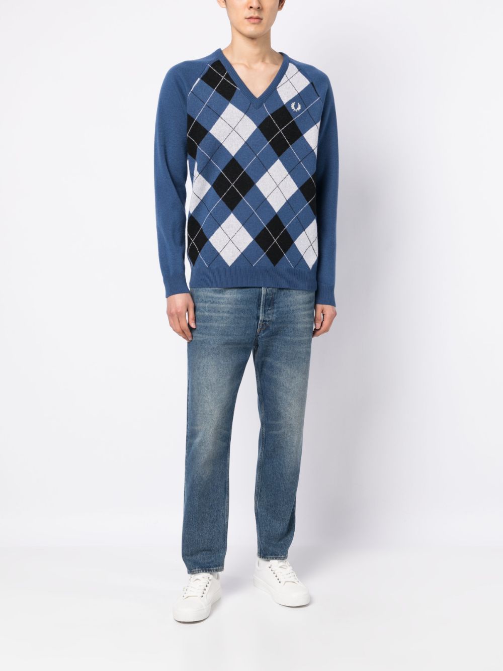 pull à carreaux avec logo brodé