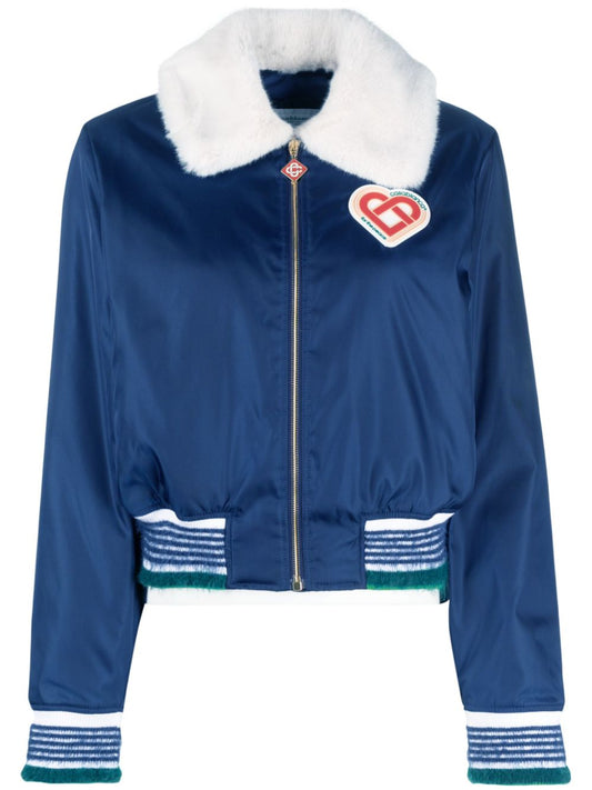 veste à col en fausse fourrure avec patch logo