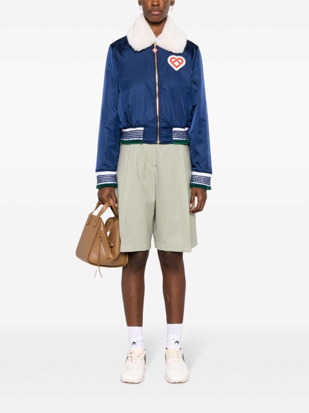 veste à col en fausse fourrure avec patch logo