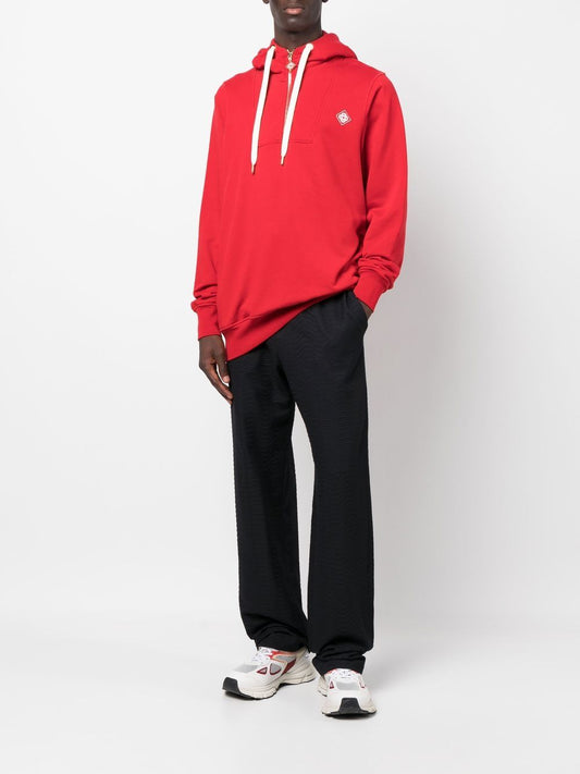 Sweat à capuche à col zippé avec patch logo