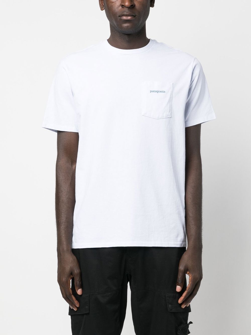 T-shirt de performance à poche plaquée
